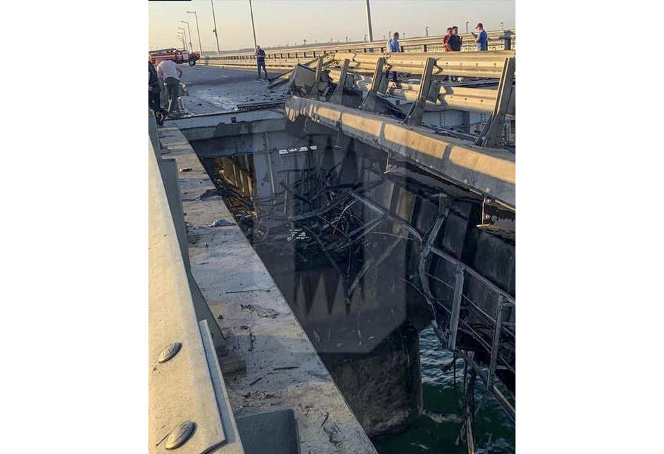 This photo released by Ostorozhno Novosti on Monday, July 17, 2023, reportedly shows damaged parts of an automobile link of the Crimean Bridge connecting Russian mainland and Crimean peninsula over the Kerch Strait not far from Kerch, Crimea. Traffic on the key bridge connecting Crimea to Russia's mainland was halted on Monday, July 17, after reports of explosions that Crimean officials said were from a Ukrainian attack.(Ostorozhno Novosti via AP)