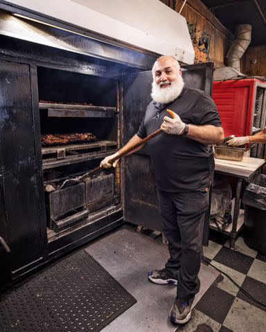 <p>Robbie Caponetto</p> Adam Itayem, owner of Tom's Barbecue, offers halal menu options such as beef ribs and brisket.