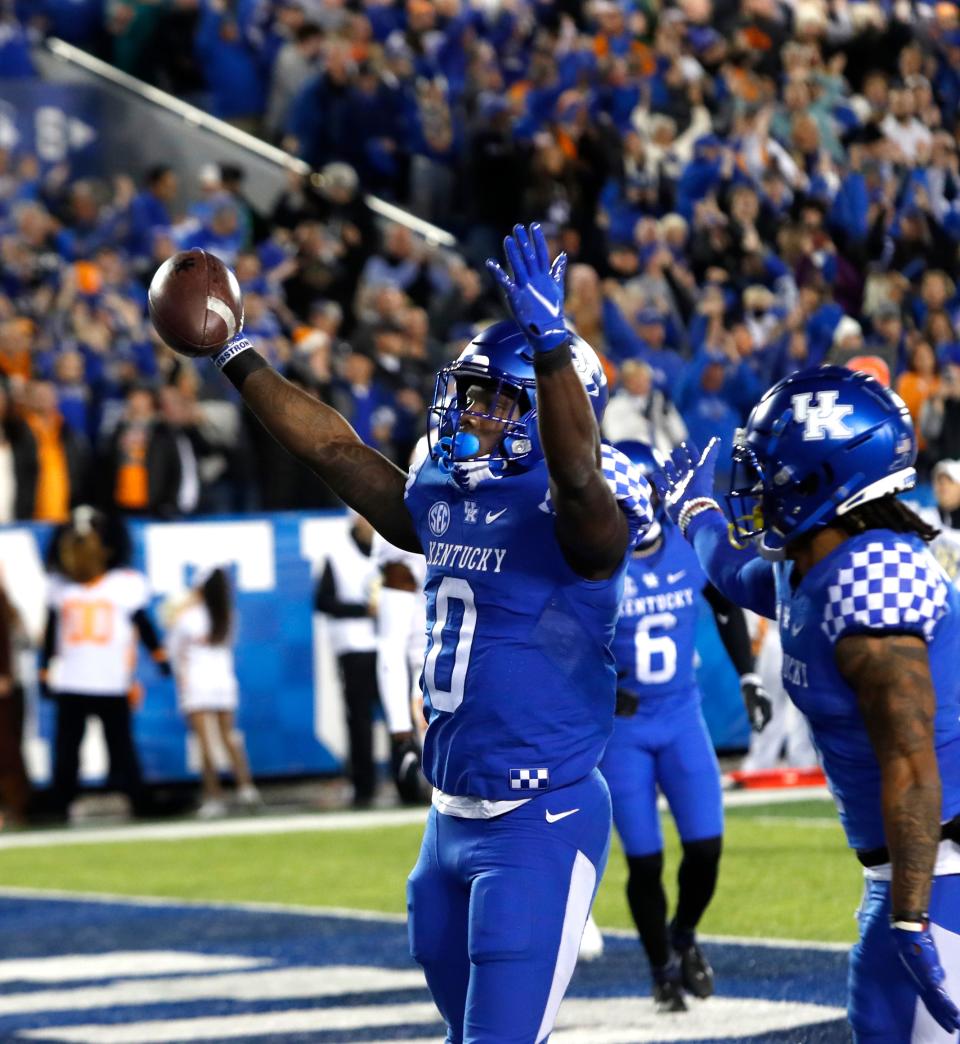 Kentucky’s Kavosiey Smoke celebrates scoring a touchdown against Tennessee.Nov. 6, 2012