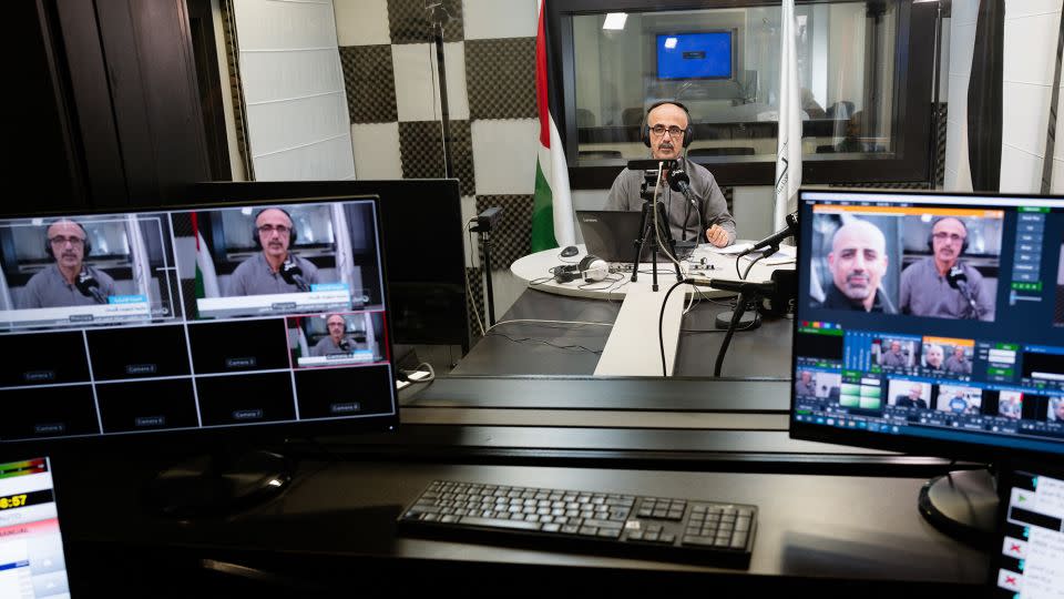 Murad Abu Al Saba, presenter at Radio Ajyal, sits at the radio station in Ramallah, West Bank, on November 22, 2023. - Alex Platt/CNN