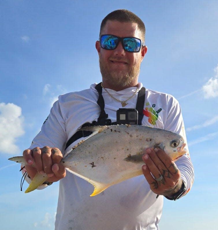 Chris Mansfield, of Reel Healin' Outdoors, shows off a nice pompano.