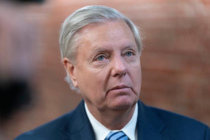 Sen. Lindsey Graham, R-S.C., speaks with reporters on Capitol Hill in Washington, Wednesday, March 16, 2022.