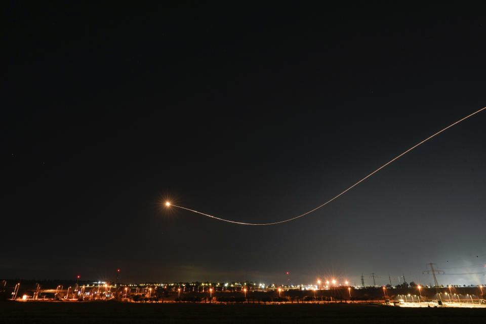 Israel's Iron Dome anti-missile system fires to intercept a rocket launched from the Gaza Strip towards Israel, near the Israeli Gaza border, Israel, Tuesday, May 2, 2023. The Israeli military says that Palestinian militants in Gaza have fired a barrage of rockets following the death of Khader Adnan, a high-profile Palestinian prisoner in Israeli custody after a nearly three-month-long hunger strike. (AP Photo/Ohad Zwigenberg)