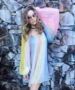 All rainbow everything! British model Suki Waterhouse looks dreamy in her flowing multi-coloured number.