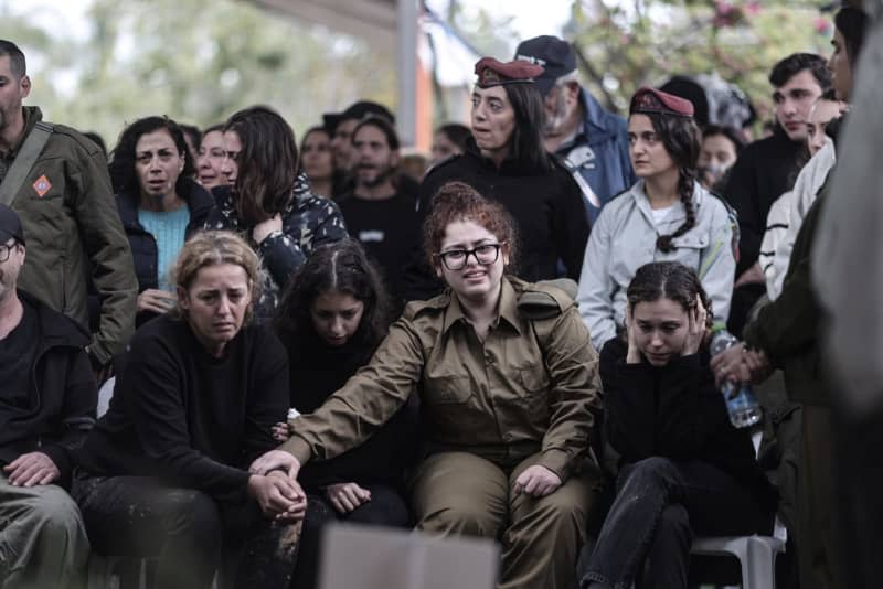 Israelis mourn during the funeral of Israeli soldier Major Ilay Levy, who was killed during fighting in the Gaza Strip. There were 21 soldiers killed in the incident, according to Israeli media. Ilia Yefimovich/dpa