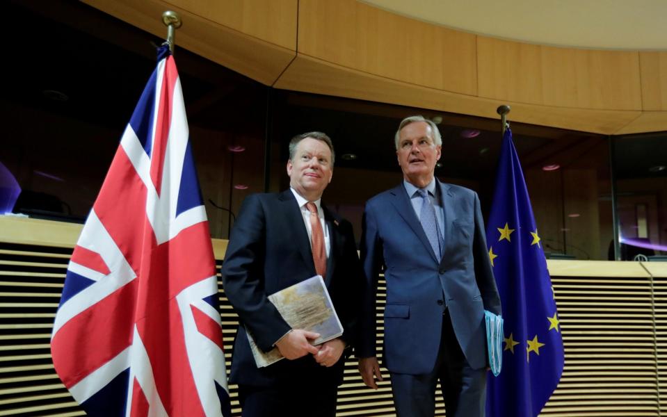 European Union chief Brexit negotiator Michel Barnier and British Prime Minister's Europe adviser David Frost 5 are seen at start of the first round of post -Brexit trade deal talks between the EU and the United Kingdom, in Brussels, Belgium March 2, 2020. - Oliver Hoslet/Pool via REUTERS/File Photo