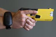 VR equipment and a version of the TASER 7 that utilizes VR technology for training, is demonstrated, Thursday, May 12, 2022, in Washington. Axon, the company that is best known for developing the Taser, is expanding virtual reality and immersive training in an effort to encourage police officers across the U.S. to more regularly train with less-than-lethal weapons. (AP Photo/Jacquelyn Martin)