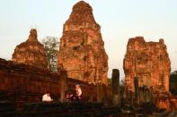 The guides and the tuk tuk guys will highly recommend Pre Rup for the sunset and I found it rather quiet compared to the other sunset points This state temple is built a few kilometers away from Angkor town and stands on the way to Banteay Srei. The towers, built in laterite, sandstone and brick, glow in the evening sun as we spend a few quiet moments before returning to Siem Reap.