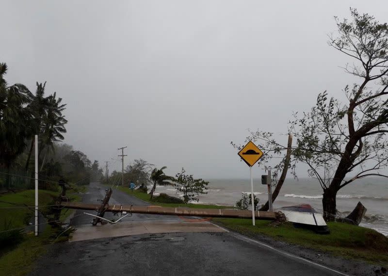 A fallen electric pole due to Cyclone Yasa lies on Lesiaceva Road in Savusavu, Fiji