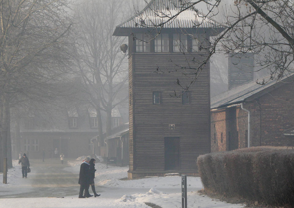 This photo taken on Friday, Jan. 27, 2017 in Oswiecim, Poland, shows a guard's tower of the former Nazi German death camp of Auschwitz that the Nazis operated in occupied Poland during World War II. Poland's historians have put online what they say is the most complete list of Nazi SS commanders and guards at Auschwitz, in hopes some of them can still be brought to justice. (AP Photo/Czarek Sokolowski)