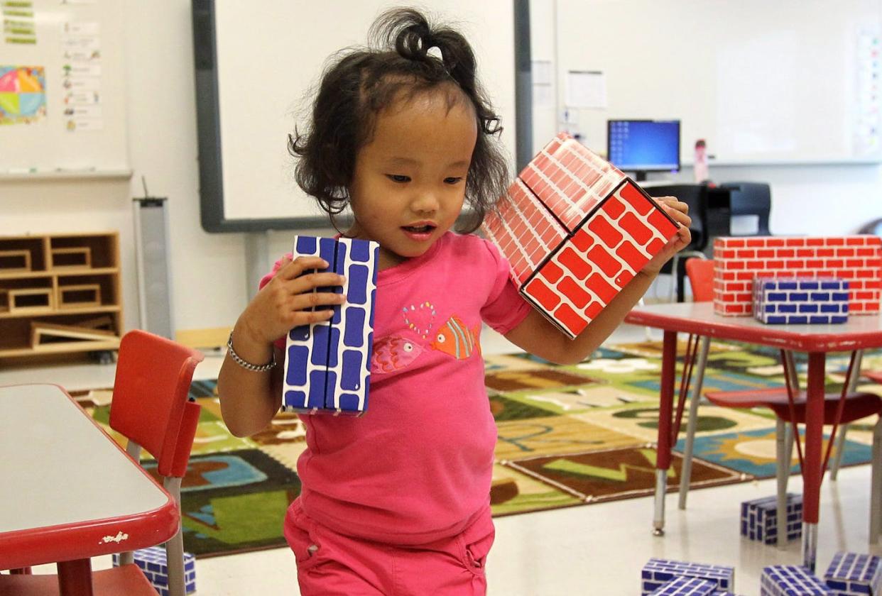 Early play-based learning helps children develop skills and knowledge before elementary school, and provides an essential foundation for learning in later years. THE CANADIAN PRESS/Lars Hagberg