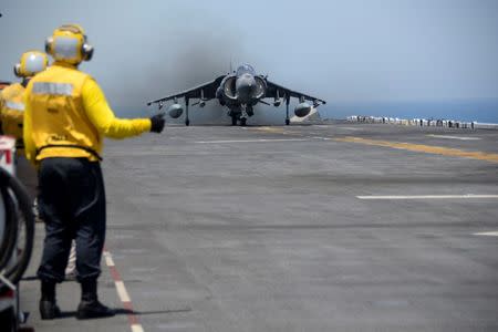 An AV-8B Harrier II launches from the amphibious assault ship USS Boxer to conduct missions in support of Operation Inherent Resolve (U.S. military's operational name for the intervention against the Islamic State of Iraq and the Levant, ISIL), in the Arabian Gulf, June 16, 2016. Mass Communication Specialist 3rd Class Michael T. Eckelbecker/U.S. Navy/Handout via Reuters