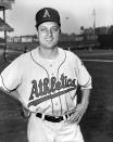 Pitcher Tommy Lasorda #23 of the Kansas City A's poses for a portrait prior to a game in 1956 against the New York Yankees at Yankee Stadium.