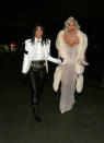 <p>Kim hit the town for another Halloween party this time, with sister Kourtney. The <i>Keeping Up With the Kardashians</i> stars dressed up as Madonna and Michael Jackson, taking wardrobe cues from the singers’ 1991 Oscars appearance. We’re sensing a Halloween theme for Kim this year. (Photo: Splash News) </p>