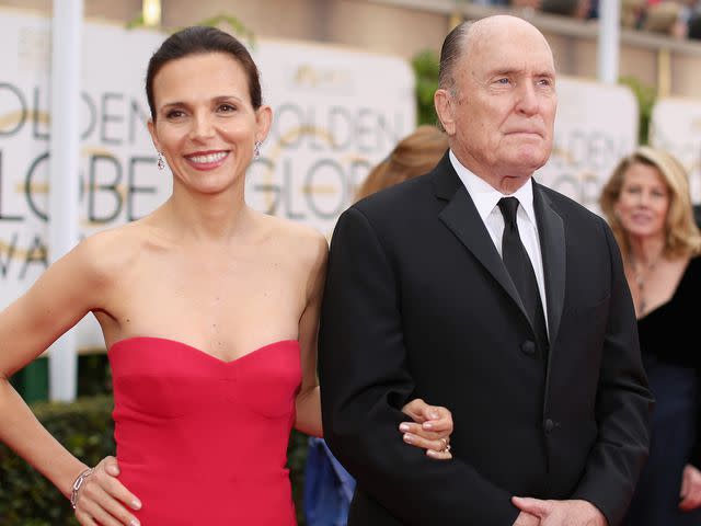 <p>Christopher Polk/NBC/NBCUniversal/Getty</p> Luciana Duvall and Robert Duvall at the 72nd Annual Golden Globe Awards on January 11, 2015.