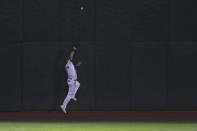 Oakland Athletics' Robbie Grossman catches a ball hit by Seattle Mariners' Joseph Odom during the eighth inning of a baseball game in Oakland, Calif., Friday, Sept. 25, 2020. (AP Photo/Jed Jacobsohn)