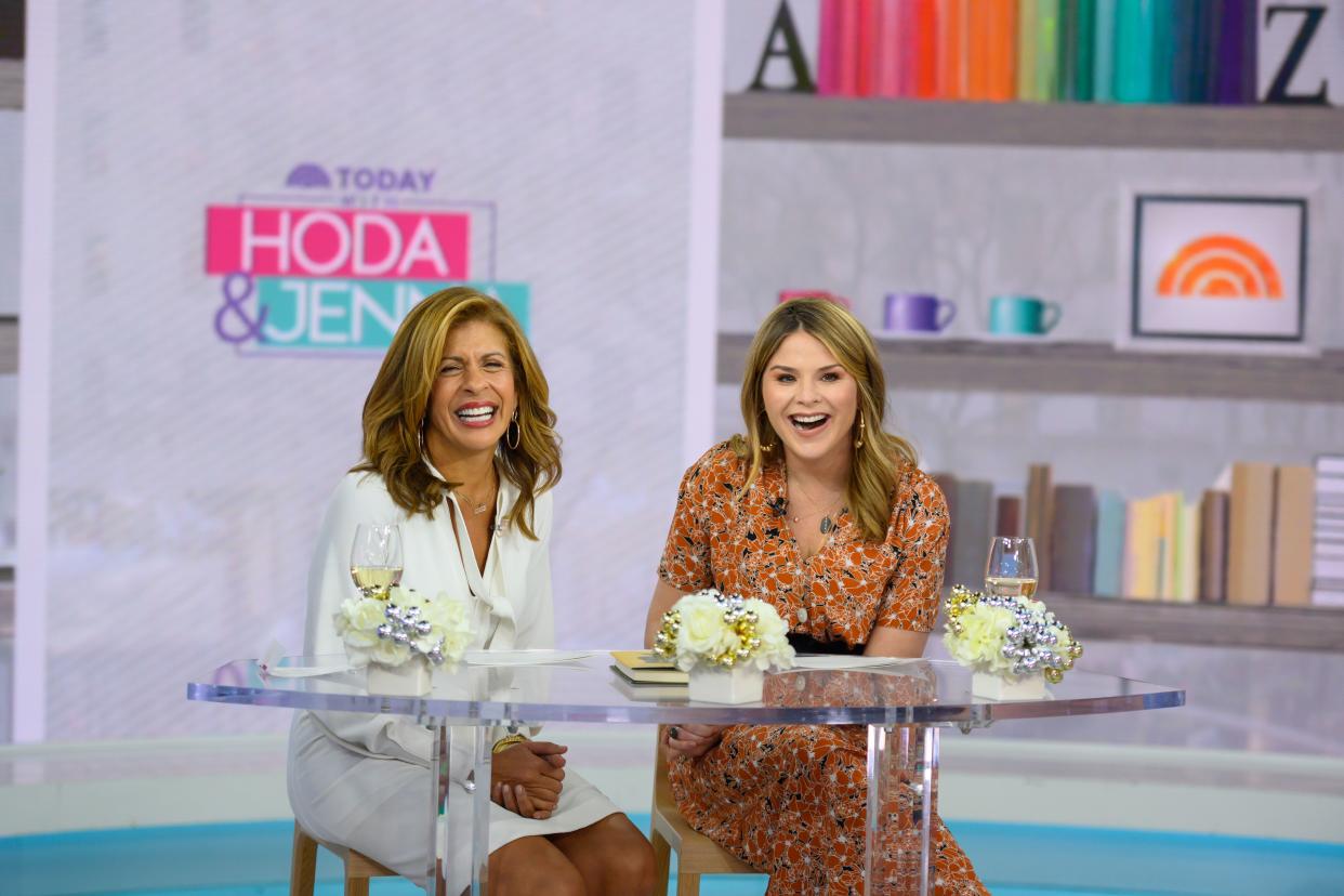 Hoda Kotb (left) and Jenna Bush Hager (right) sit at their talk show desk