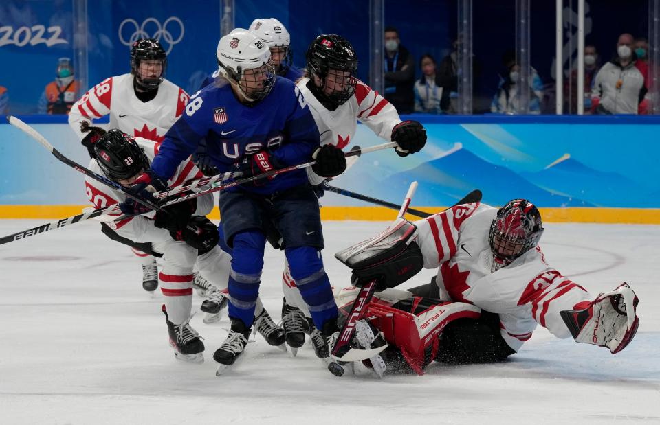 Forward Amanda Kessel (28) has overcome concussion symptoms to become of the U.S. women's hockey team's top scorers in Beijing.