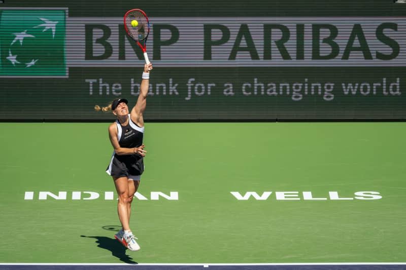 German tennis player Angelique Kerber in action against Croatian Petra Martic during their women's singles first round match of the Indian Wells Open tennis tournament. Maximilian Haupt/dpa