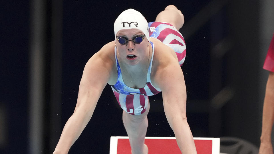 FILE - Lilly King of the United States starts in her heat of the women's 100-meter breaststroke at the 2020 Summer Olympics on July 25, 2021, in Tokyo, Japan. Although there is scant scientific evidence that razoring off every bit of exposed hair actually produces faster times, swimmers cling to this tradition before every big meet. (AP Photo/Matthias Schrader, File)