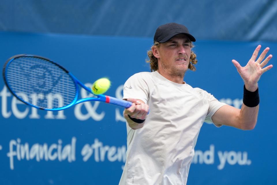 Max Purcell, of Australia, hits a forehand to Casper Ruud, of Norway, during the Western & Southern Open at the Lindner Family Tennis Center in Mason on Wednesday, Aug. 16, 2023.