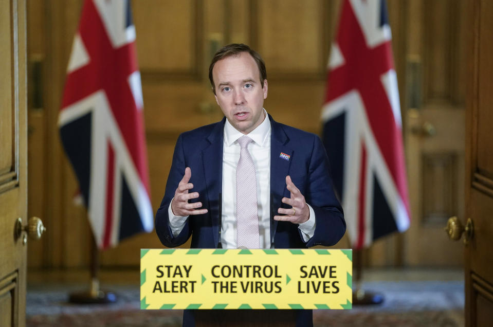 In this photo issued by 10 Downing Street, Britain's Health Secretary Matt Hancock speaks during a coronavirus media briefing in Downing Street, London, Friday May 15, 2020. (Andrew Parsons/10 Downing Street via AP)