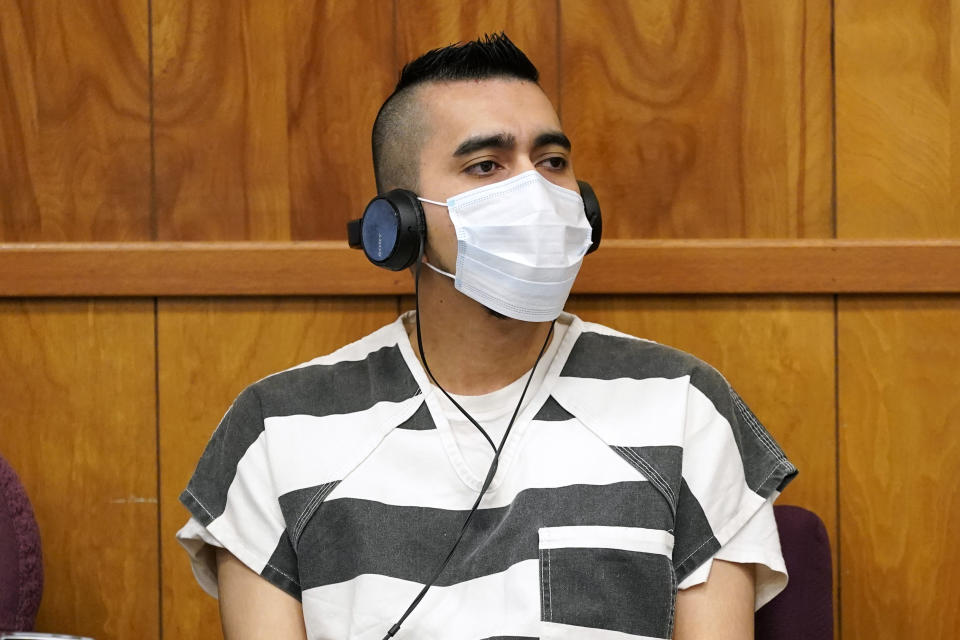 Cristhian Bahena Rivera listens to proceedings during his sentencing, Monday, Aug. 30, 2021, at the Poweshiek County Courthouse in Montezuma, Iowa. Rivera was sentenced to life in prison for the stabbing death of college student Mollie Tibbetts, who was abducted as she was out for a run near her small eastern Iowa hometown in July of 2018. (AP Photo/Charlie Neibergall, pool)