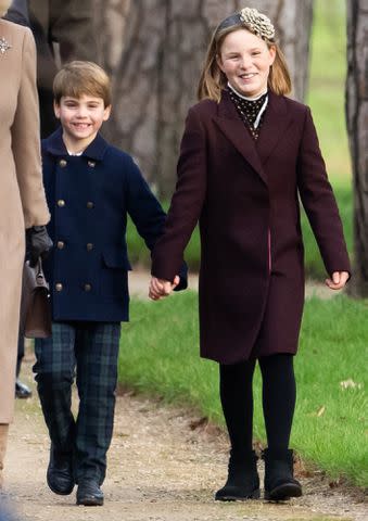 <p>Samir Hussein/WireImage</p> Prince Louis and Mia Tindall at Christmas 2023