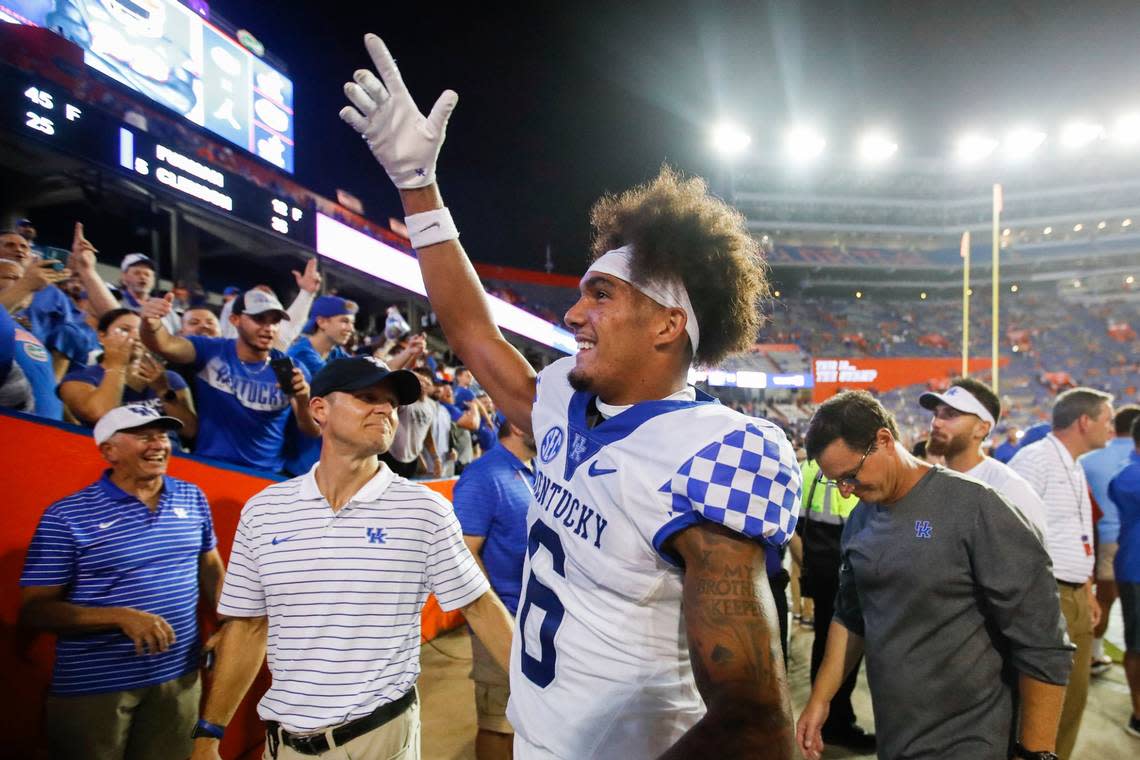 Kentucky wide receiver Dane Key celebrates on the field after his team’s victory over Florida on Saturday in Gainesville.