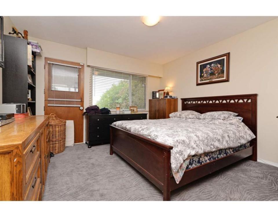 <p><span>324 Blue Mountain St., Coquitlam, B.C.</span><br>There are three bedrooms, including two on the main level and one in the basement. There are also two bathrooms.<br> (Photo: Zoocasa) </p>