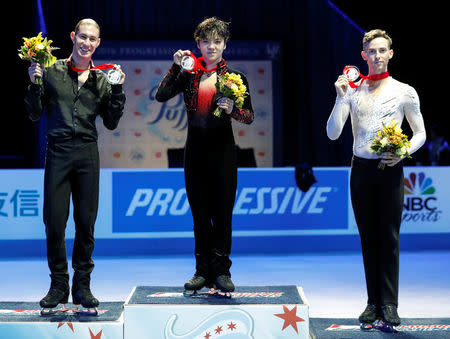 Figure Skating - Skate America, Award Ceremony, Hoffman Estates, Illinois, U.S., 23/10/16. First place winner of the men free skating Shoma Uno of Japan (C), second place Jason Brown (L) of United States, and third place Adam Rippon (R) of United States, pose with their medals during the awards ceremony at the Skate America competition. REUTERS/Kamil Krzaczynski