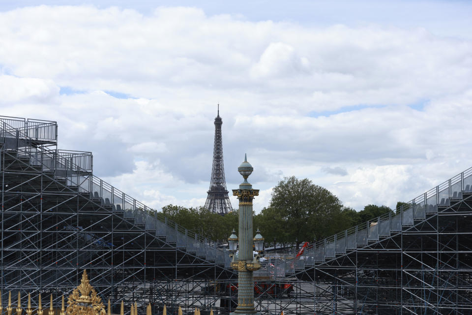 FILE - Constructions are under way on Place de la Concorde Monday, May 6, 2024 in Paris. Place de la Concorde is where Louis XVI and Marie Antoinette were guillotined in 1793. It's also been home to the Luxor Obelisk for nearly 200 years. This summer B-boys and B-girls as well BMX freestylers, 3-on-3 basketballers and skateboarders will compete there. (AP Photo/Aurelien Morissard, File)