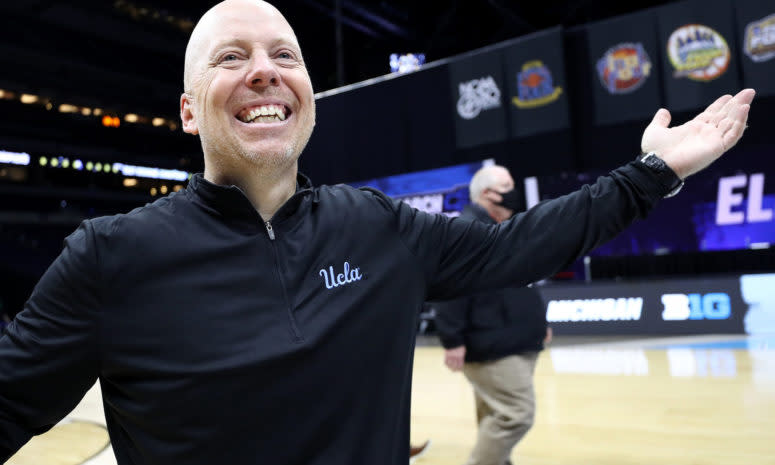UCLA basketball head coach Mick Cronin celebrates Elite Eight win.