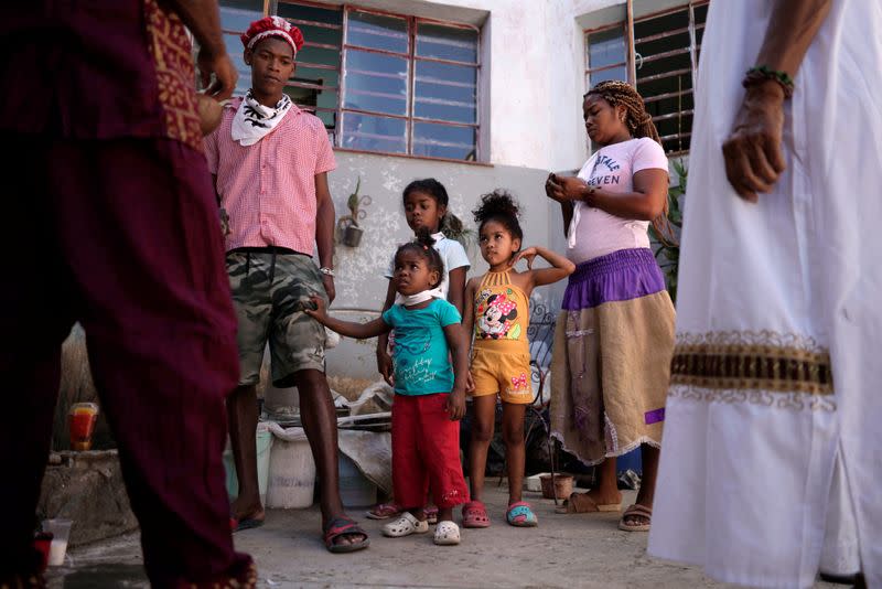 Followers of the Afro-Cuban religion Santeria pray for the spirits amid concerns about the spread of the coronavirus disease outbreak in Havana