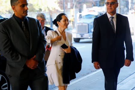 Huawei Technologies Chief Financial Officer Meng returns to British Columbia supreme court after a lunch break during a hearing in Vancouver