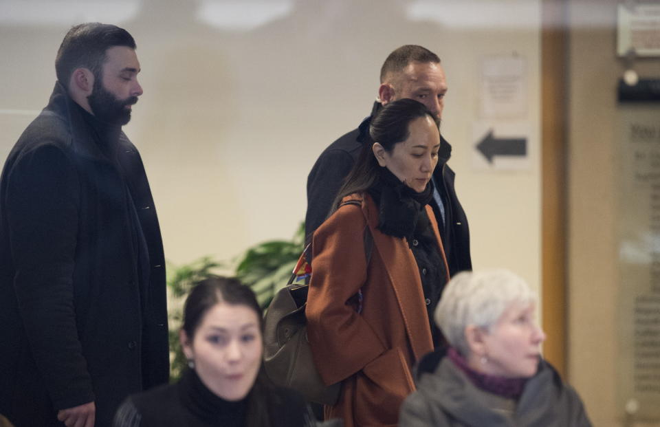 Huawei chief financial officer Meng Wanzhou, who is out on bail and remains under partial house arrest after she was detained last year at the behest of American authorities, leaves B.C. Supreme Court following a case management hearing, Friday, Jan. 17, 2020, in Vancouver, British Columbia. (Jonathan Hayward/The Canadian Press via AP)