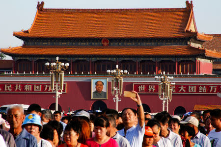 People line up to visit the mausoleum of China's late Chairman Mao Zedong on the 40th anniversary of his death in Beijing, China, September 9, 2016. REUTERS/Thomas Peter