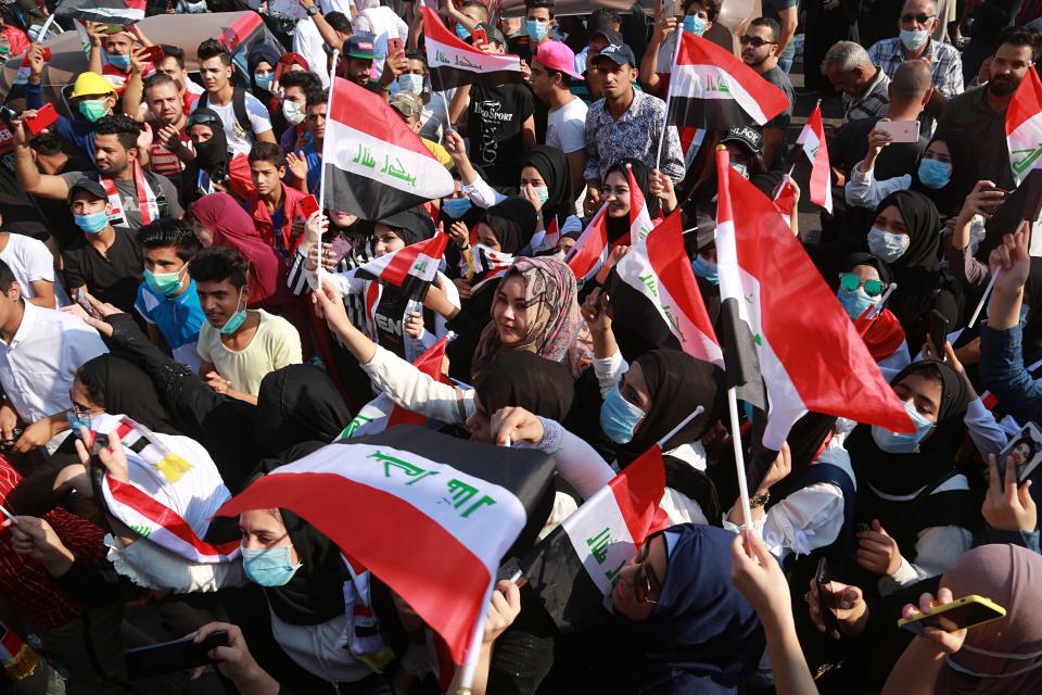 Anti-government protesters gather in Tahrir Square during ongoing protests in Baghdad, Iraq, Thursday, Oct. 31, 2019. (AP Photo/Hadi Mizban)