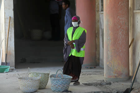 A construction worker takes part in the the renovation project of Somalia's National Theatre in Mogadishu, Somalia February 3, 2019. Picture taken February 3, 2019. REUTERS/Feisal Omar