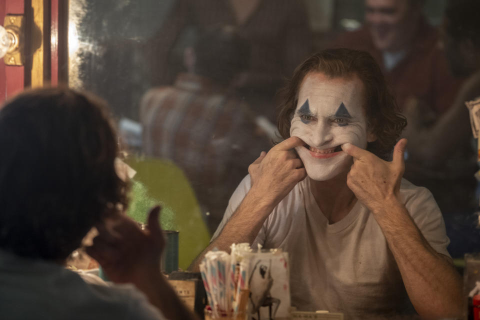 This image released by Warner Bros. Pictures shows Joaquin Phoenix in a scene from "Joker," in theaters on Oct. 4. (Niko Tavernise/Warner Bros. Pictures via AP)