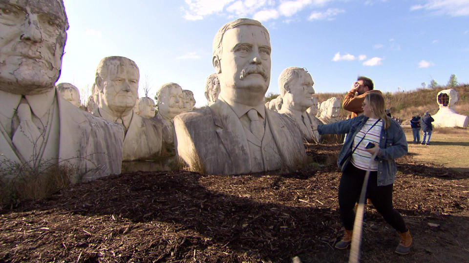 From Washington to Bush 43: Visitors walk past 42 giant busts of U.S. presidents (there is only one Grover Cleveland).  / Credit: CBS News