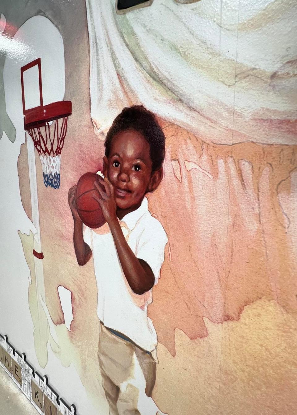 Titled "The Kid. The King. The One," a mural created by Stark County-based artist Dirk Rozich depicts different periods in the life of Akron native and NBA superstar LeBron James. The three-piece mural is on display at House Three Thirty at the entrance to the LeBron James museum in Akron.