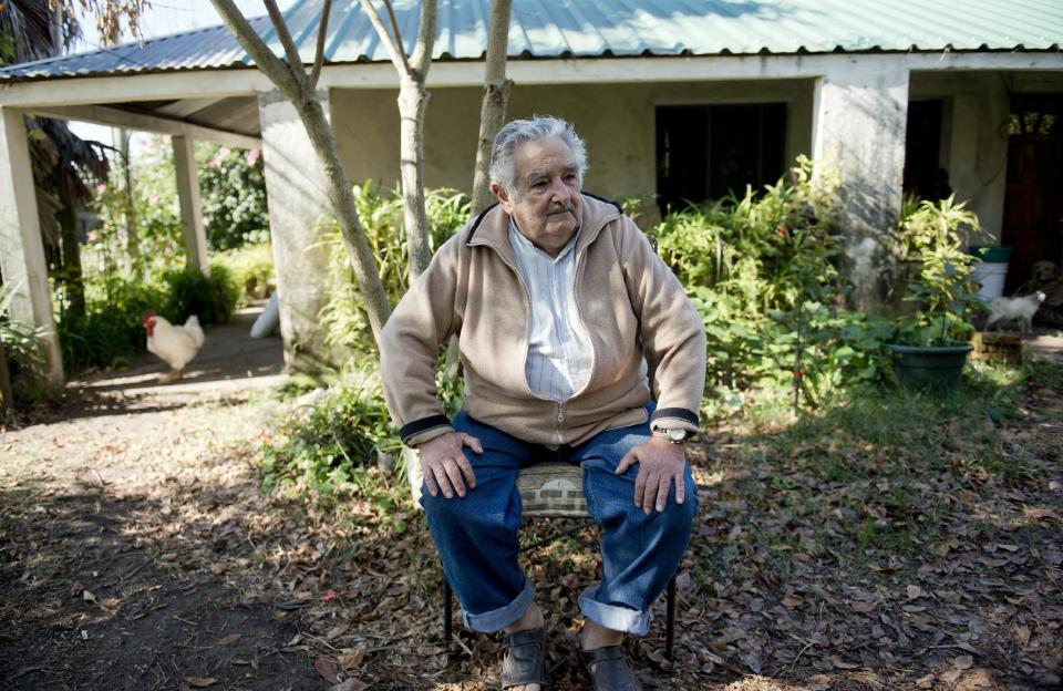 Uruguay's President Jose Mujica sits outside his home during an interview on the outskirts of Montevideo, Uruguay, Friday, May 2, 2014. Mujica said Friday that his country’s legal marijuana market will be much better than Colorado’s, where he says the rules are based on “fiction” and “hypocrisy” because the state loses track of the drug once it’s sold and many people fake illnesses to get prescription weed. Mujica says this won’t be allowed in Uruguay, where the licensed and regulated market will be much less permissive with drug users. (AP Photo/Matilde Campodonico)