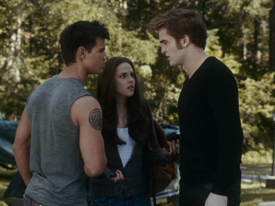 Taylor Lautner as Jacob, Kristen Stewart as Bella, and Robert Pattinson as Edward in "Twilight."