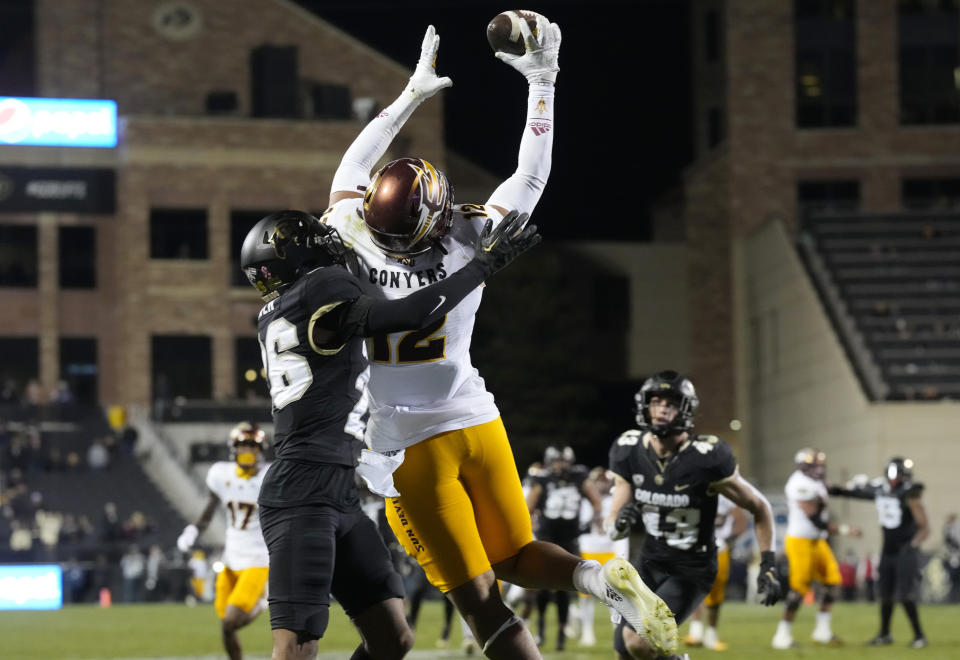 Arizona State tight end Jalin Conyers, right, pulls in a pass for a touchdown as Colorado cornerback Jason Oliver defends in the second half of an NCAA college football game Saturday, Oct. 29, 2022, in Boulder, Colo. (AP Photo/David Zalubowski)
