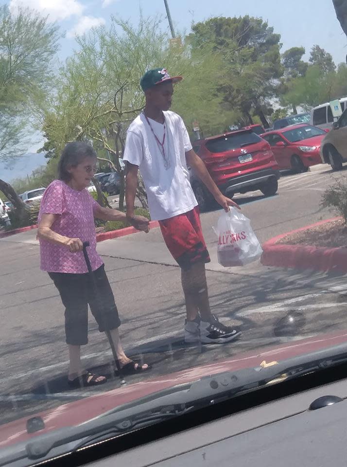A video of 13-year-old Dashawn Butler helping an elderly woman walk to her car went viral this week. (Photo: Maria Lopez)
