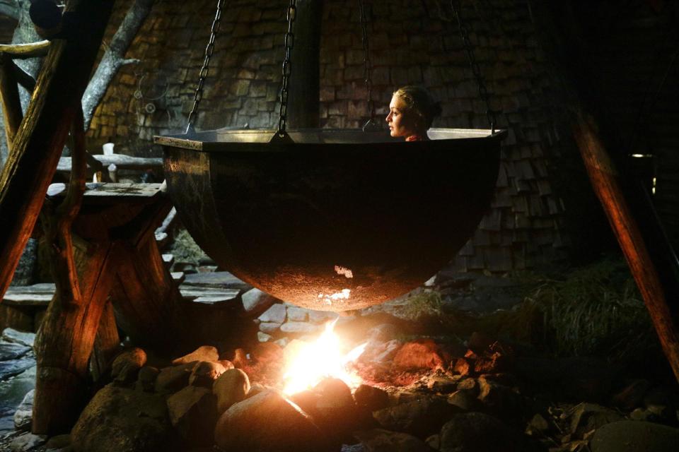 Olga Gharkova bathes in a hot pot at the British Banya bathhouse, Saturday, Feb. 15, 2014, in Krasnaya Polyana, Russia. "The most important thing about the banya is to have a good spirit in the body," says bathhouse master Ivan Tkach. (AP Photo/Jae C. Hong)