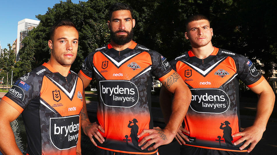 Pictured from left to right is Wests Tigers trio Luke Brooks, James Tamou and Adam Doueihi.