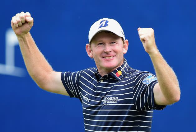 Brandt Snedeker celebrates raising both fists