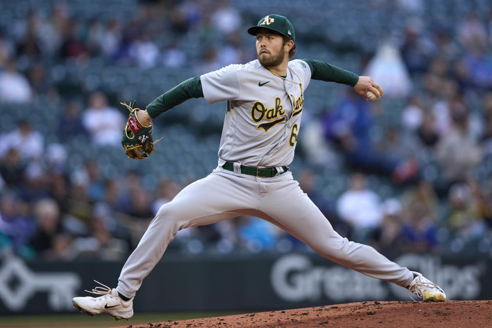 Oakland Athletics pitcher Ken Waldichuk throws to a Seattle Mariners batter during the second inning of a baseball game Wednesday, May 24, 2023, in Seattle. (AP Photo/John Froschauer)